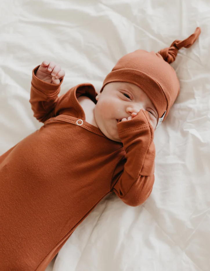 Copper Pearl Newborn Knotted Gown in Moab Roman & Leo Cool