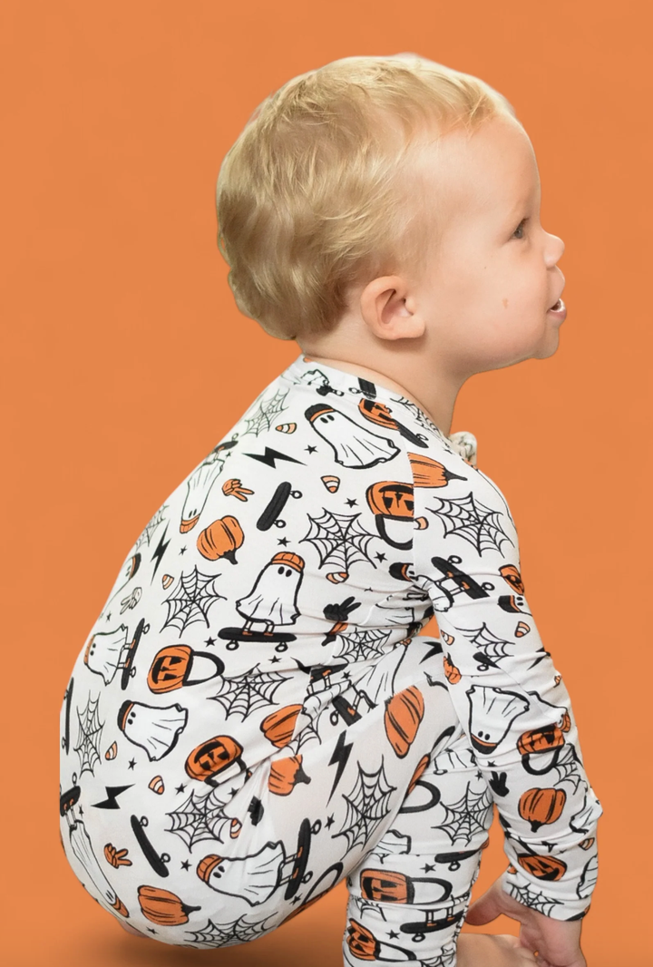 Baby Halloween pajamas with ghosts and jack-o-lantern