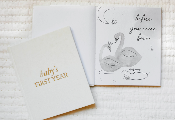 
Baby's first year baby book in cream
