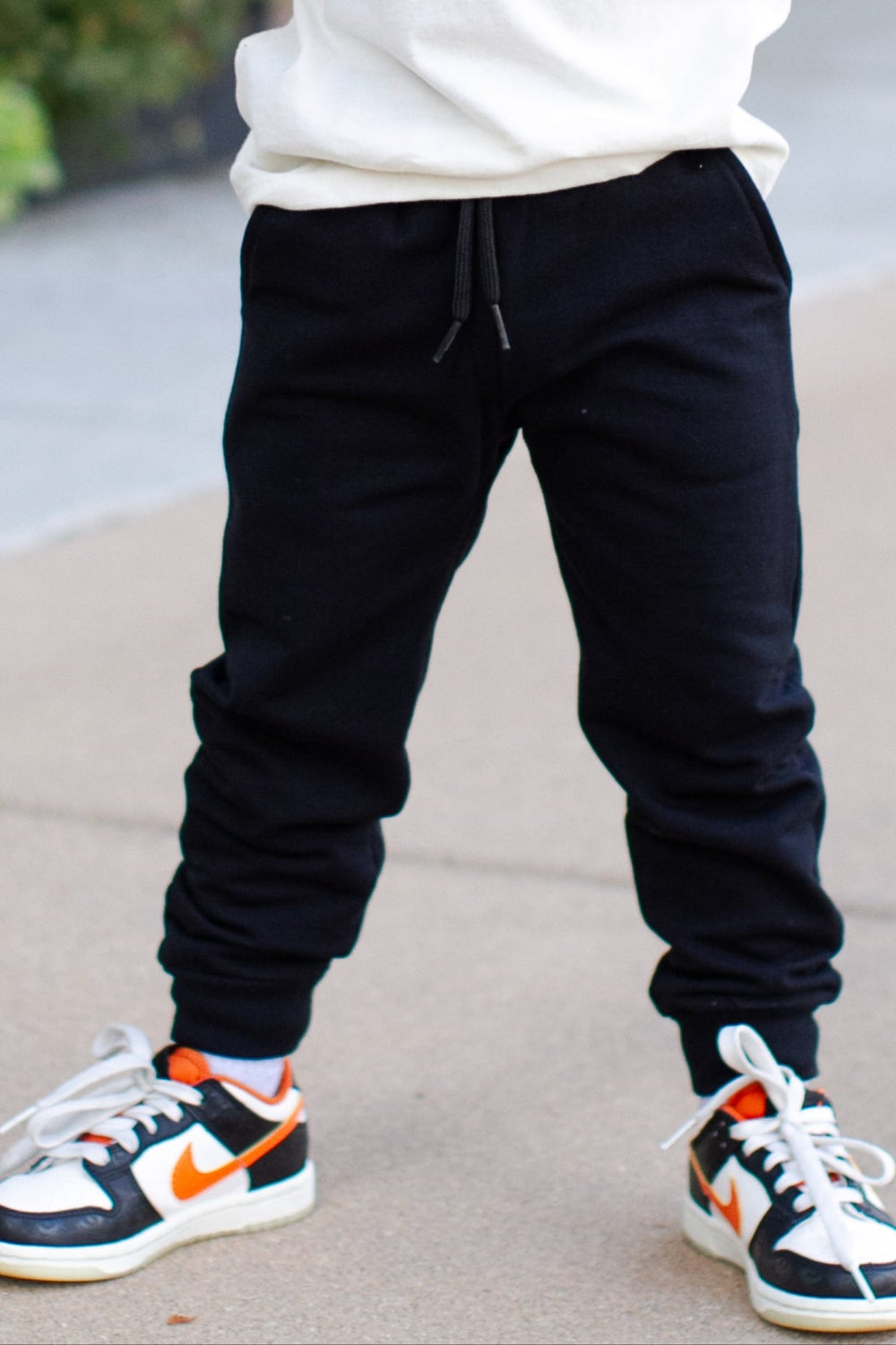 Boys black joggers by Mayoral