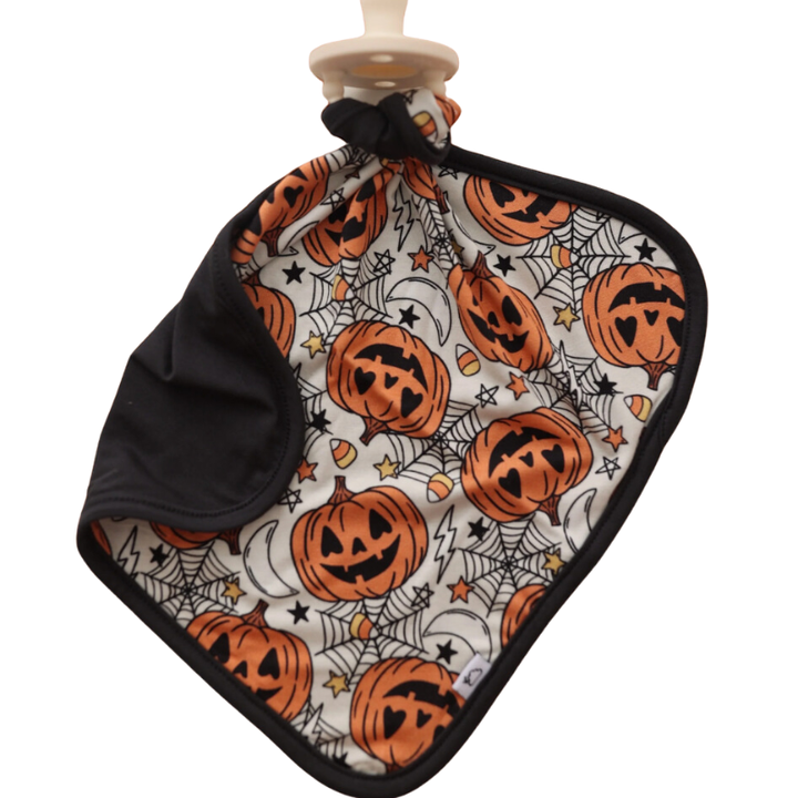 Dream Big Little Co pumpkin pacifier lovey