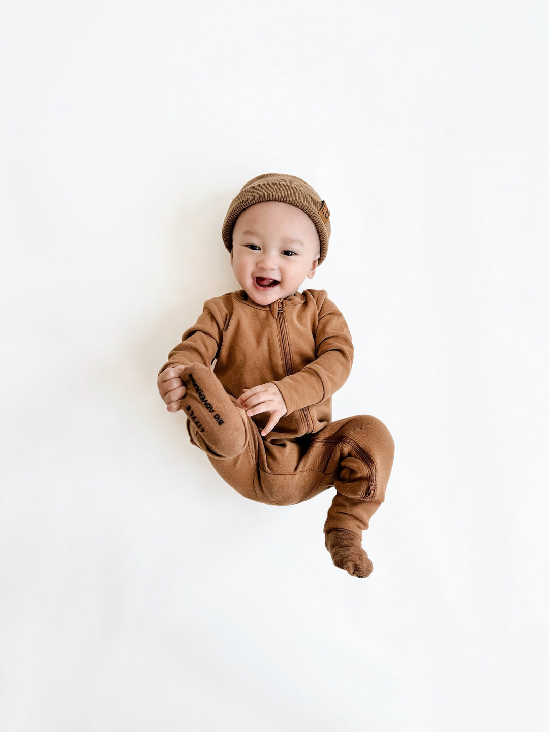 Little Bipsy Caramel two way zip romper