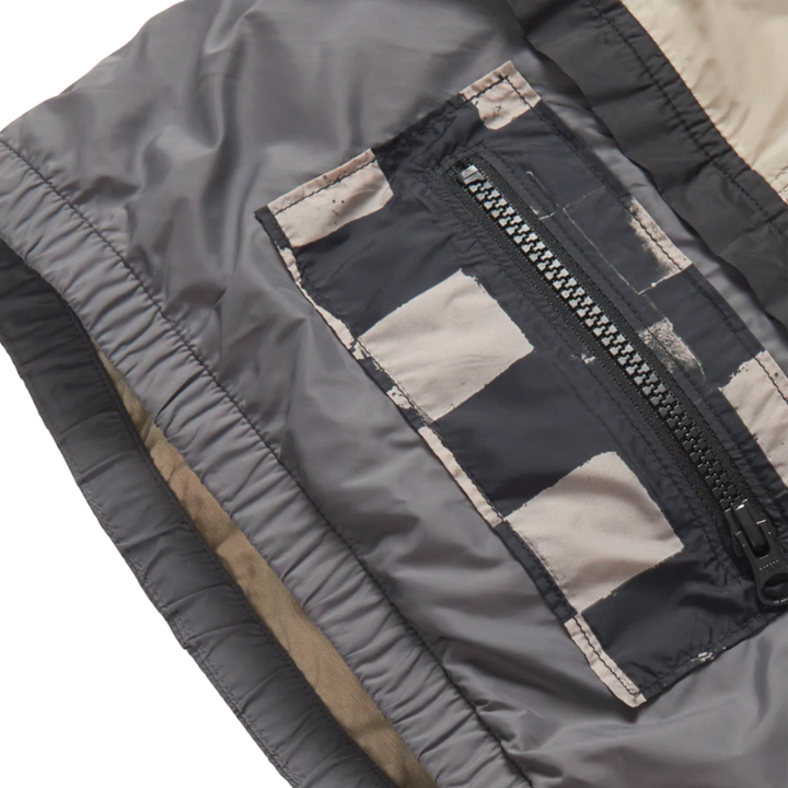 Little Bipsy checkered windbreaker jacket detail