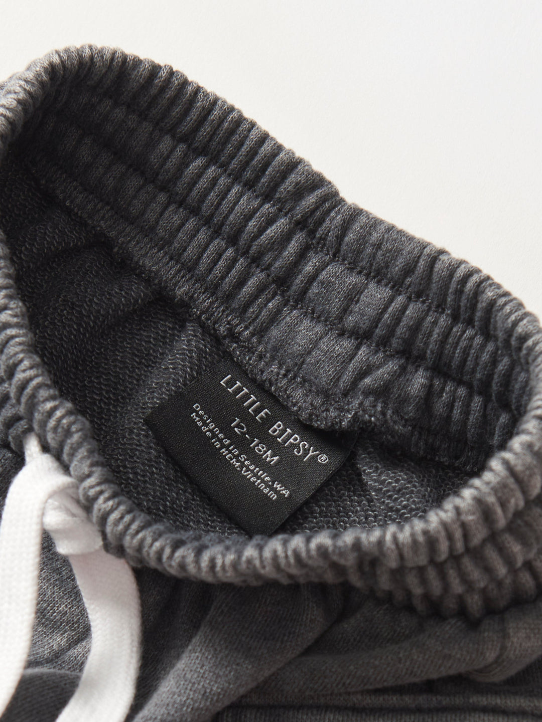 Little Bipsy raw edge cargo shorts in charcoal wash detail