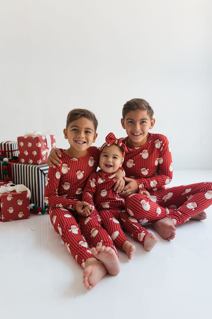 Matching family Christmas pajamas red santas