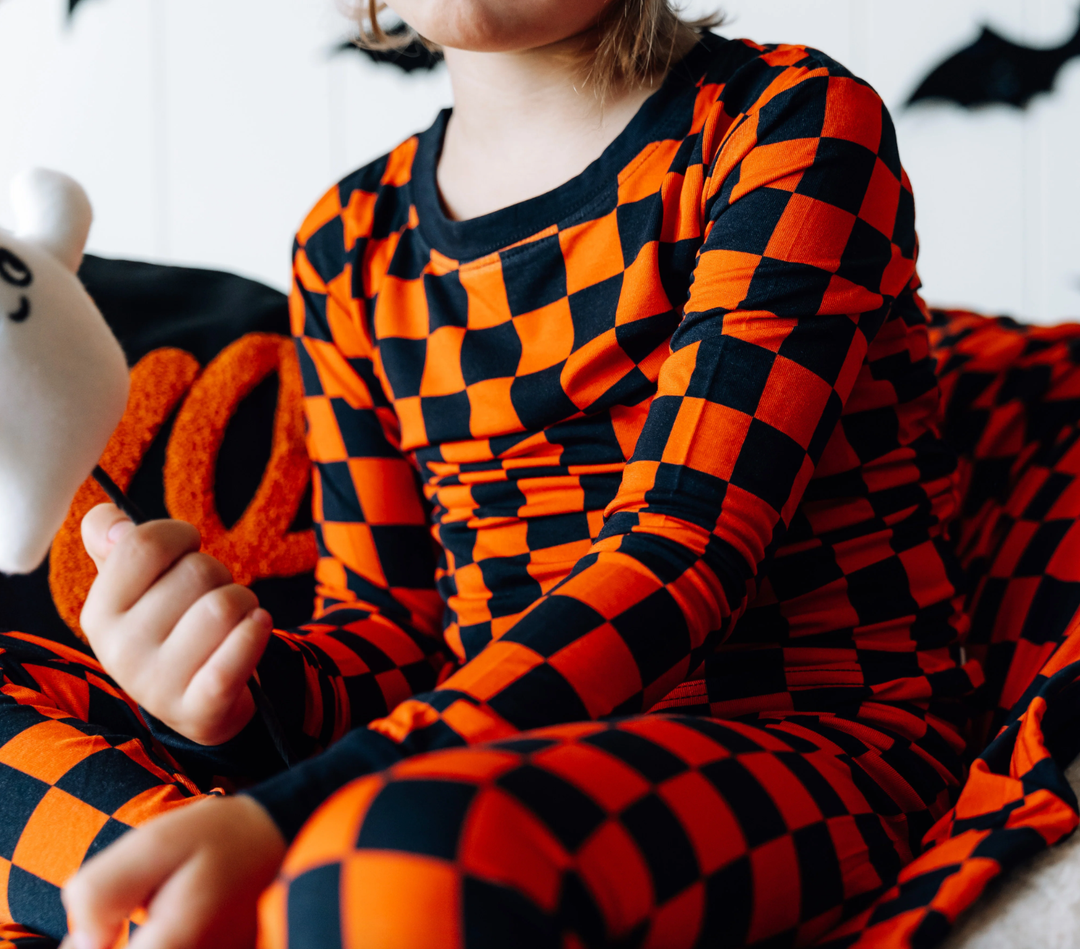 kids black and orange checker pajamas