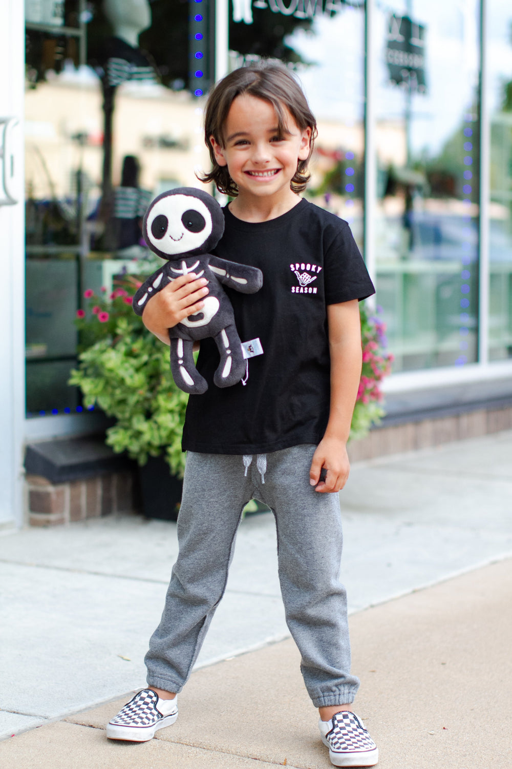 Spooky Season skeleton hand kids tee