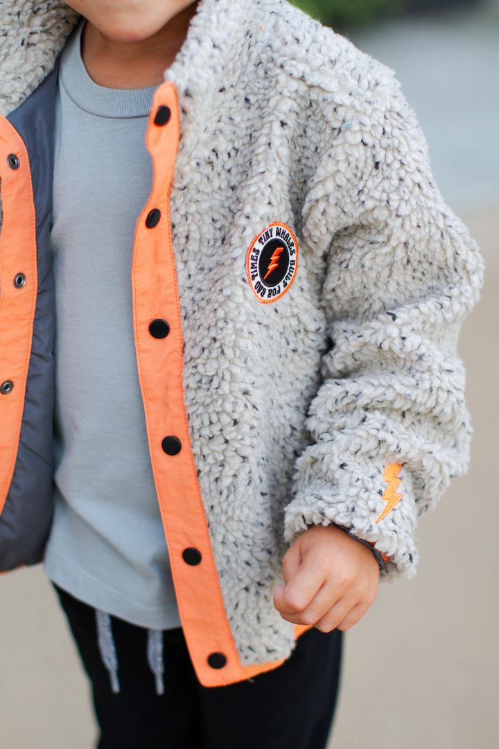 boys tan and orange sherpa jacket