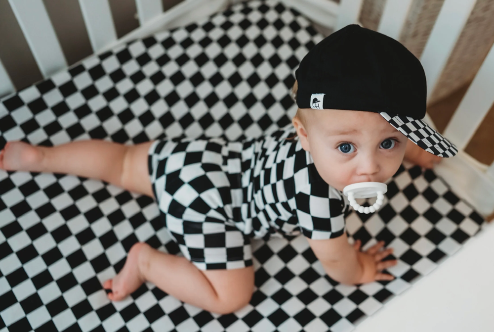 black and white checkered baby pajamas